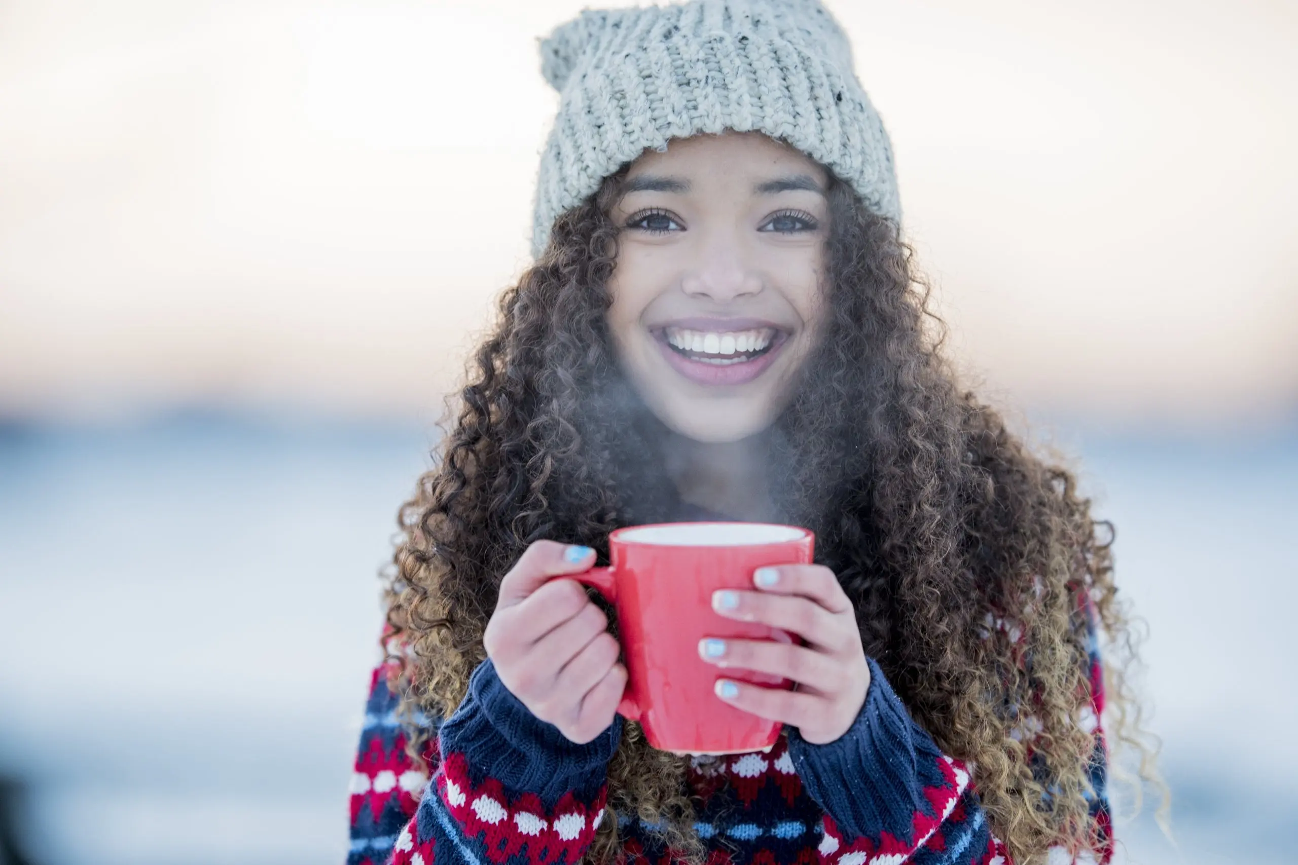 Woman smiling during the winter
