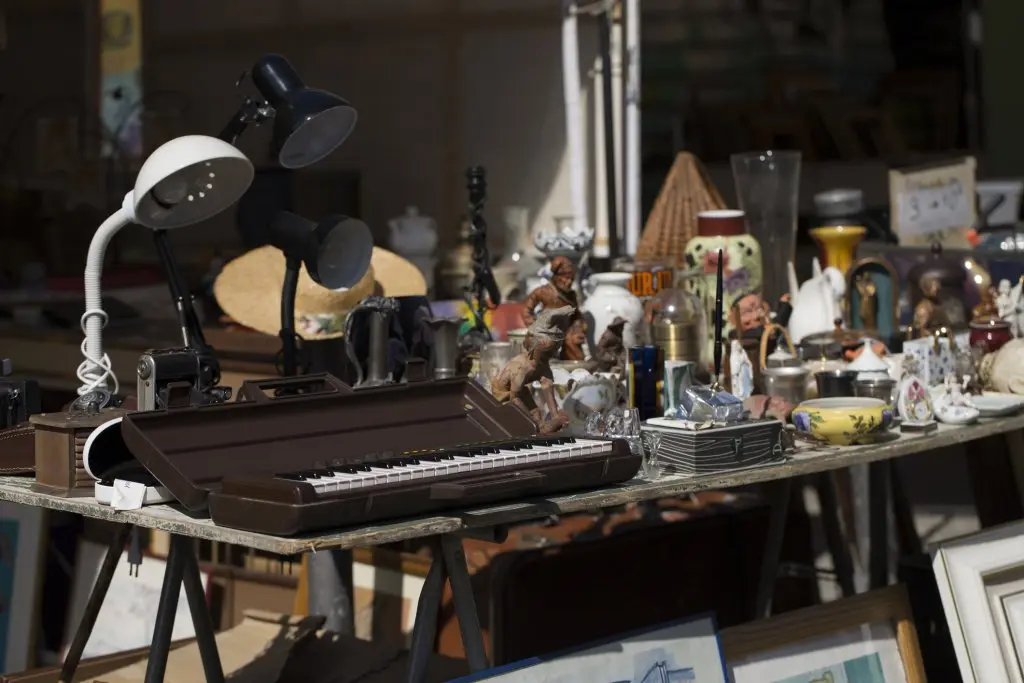 random collection of items on sale at a garage sale 