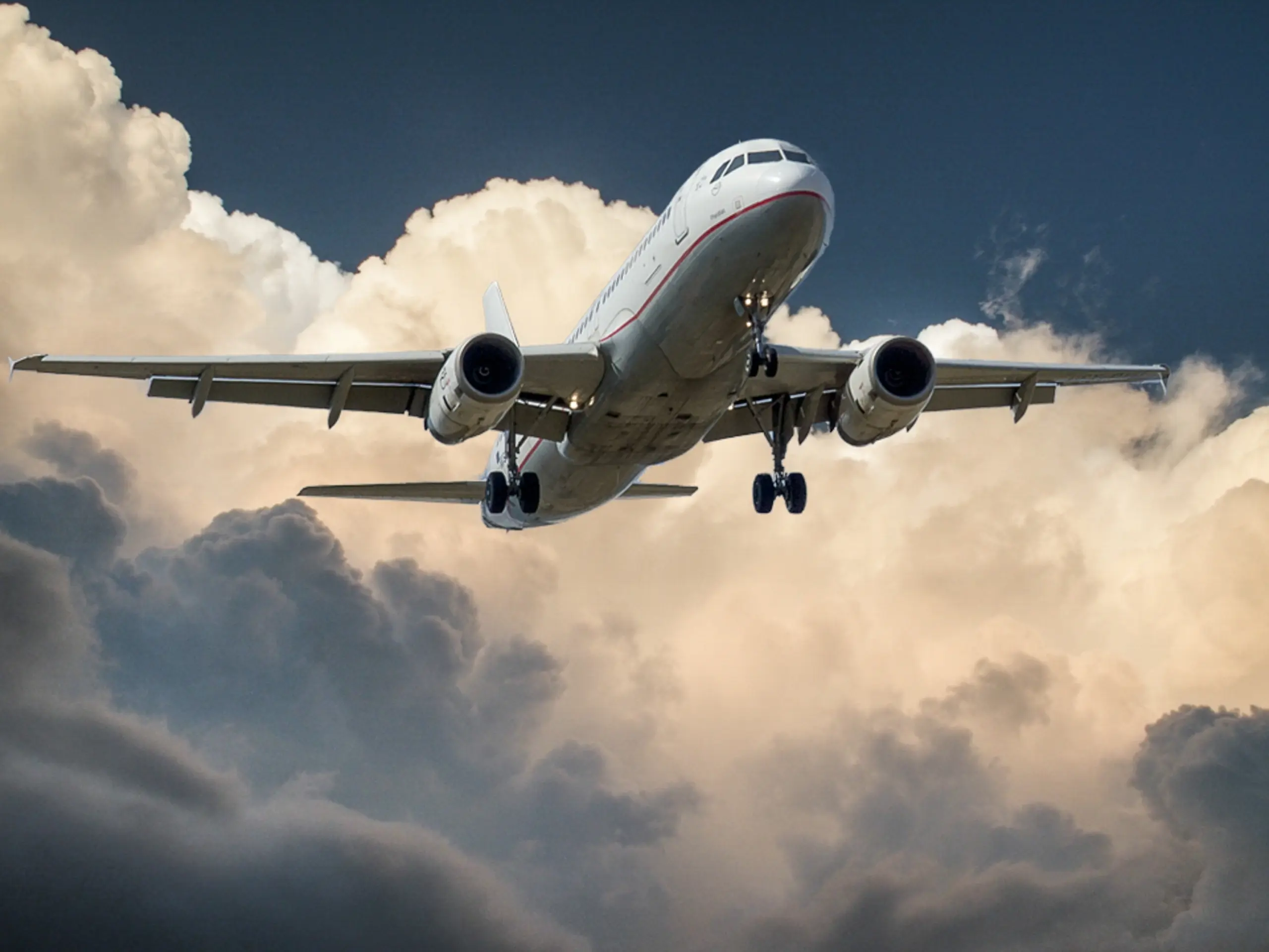 airplane flying in clouds
