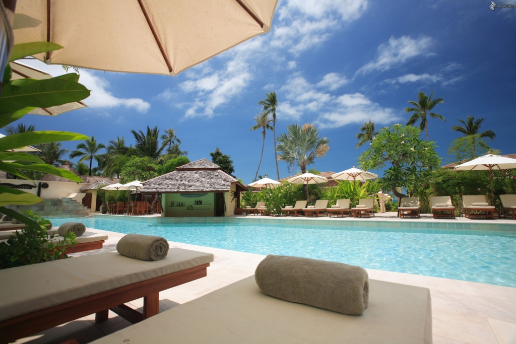 Serene resort with a sparkling pool, perfect for your dream vacation