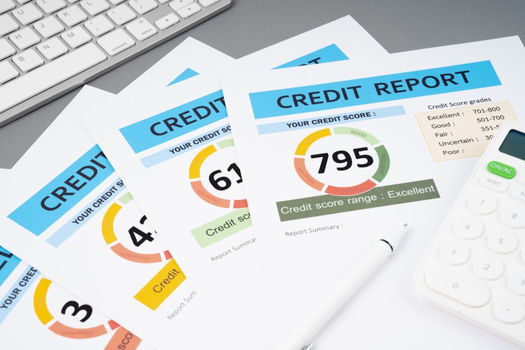 A series of credit reports ranging from good to poor scores. Soft credit checks don’t affect these reports, but hard credit checks can add up and drag your score down by a few points at a time.
