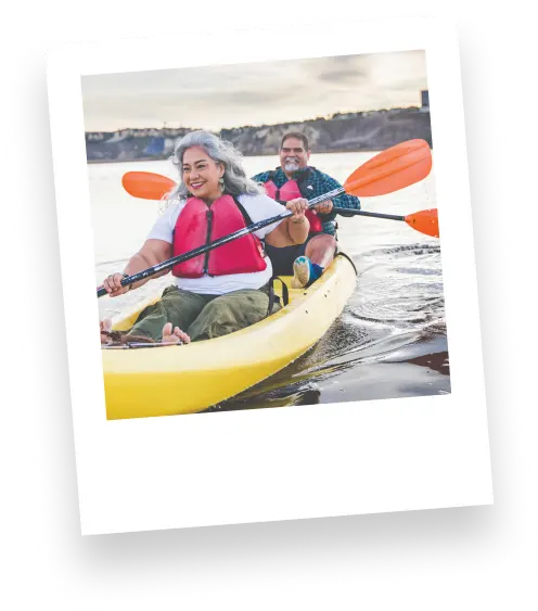 Polaroid photo of a couple on a kayak